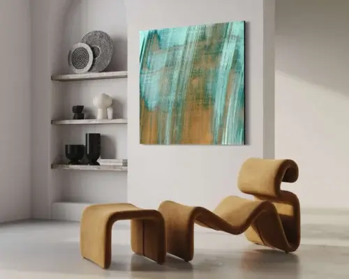Large contemporary wall art in teal and copper like corroding copper hangs on white wall in living room above funk brown chaise lounge next to wall of open shelving.