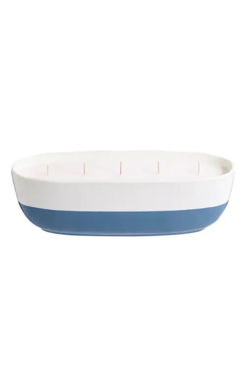 Tall blue and white candle with coastal-inspired color, shown on a white background.