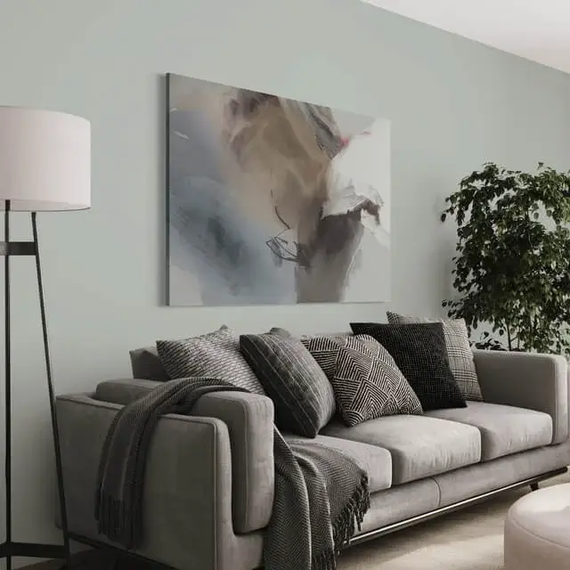 Blue, Gray, and White Large Abstract Art completes the sophisticated gray living room's aesthetic.