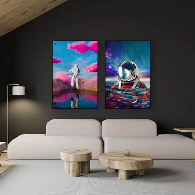 Extra large surreal astronaut wall art hangs side by side in modern black and white living room