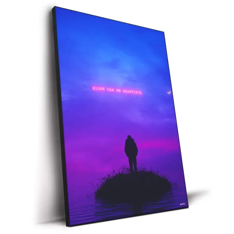 A solitary figure on an island during a colorful sunset, with the text "ALONE CAN BE BEAUTIFUL" displayed above.